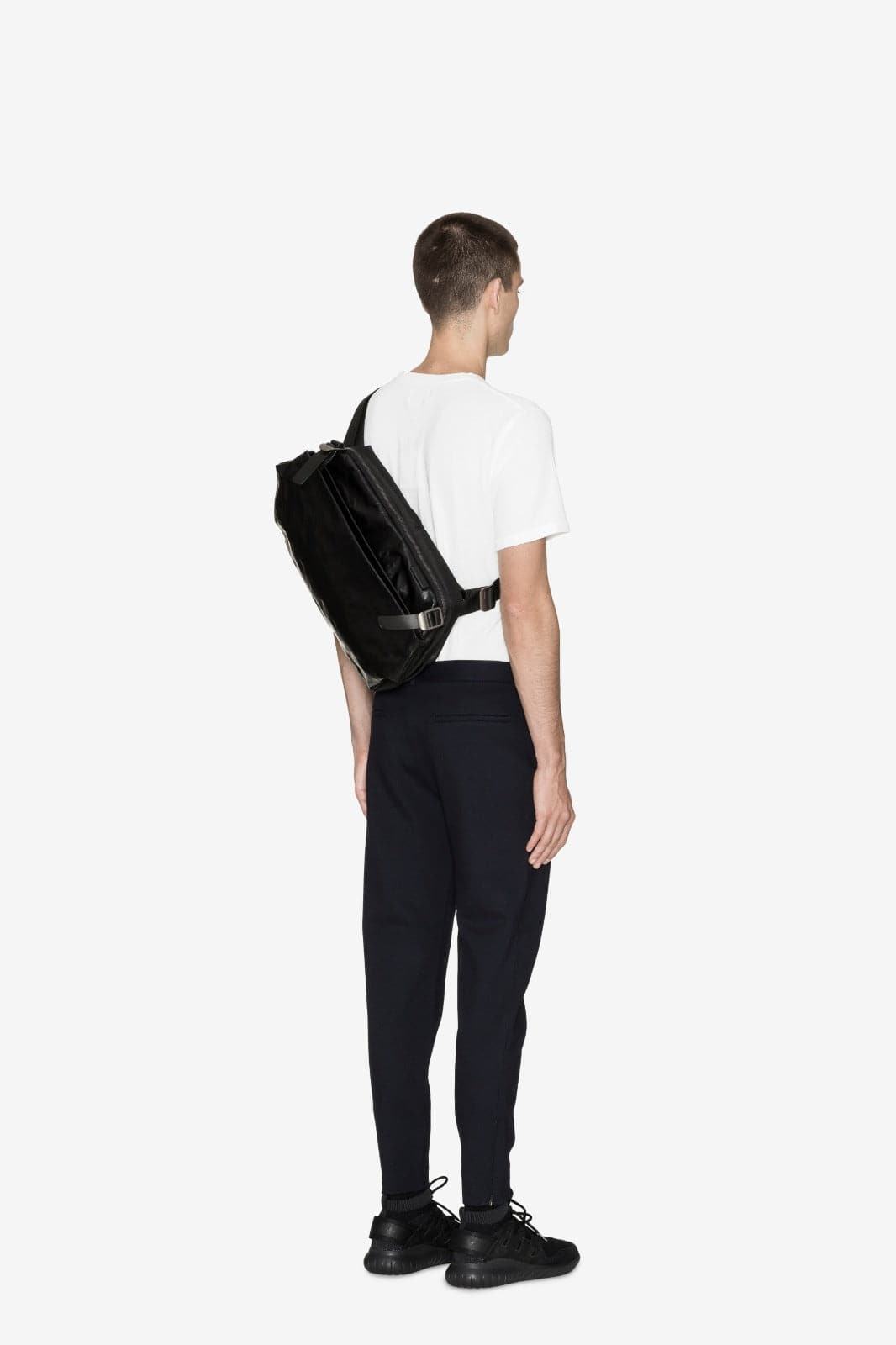 Black Muswell checked coated-canvas backpack